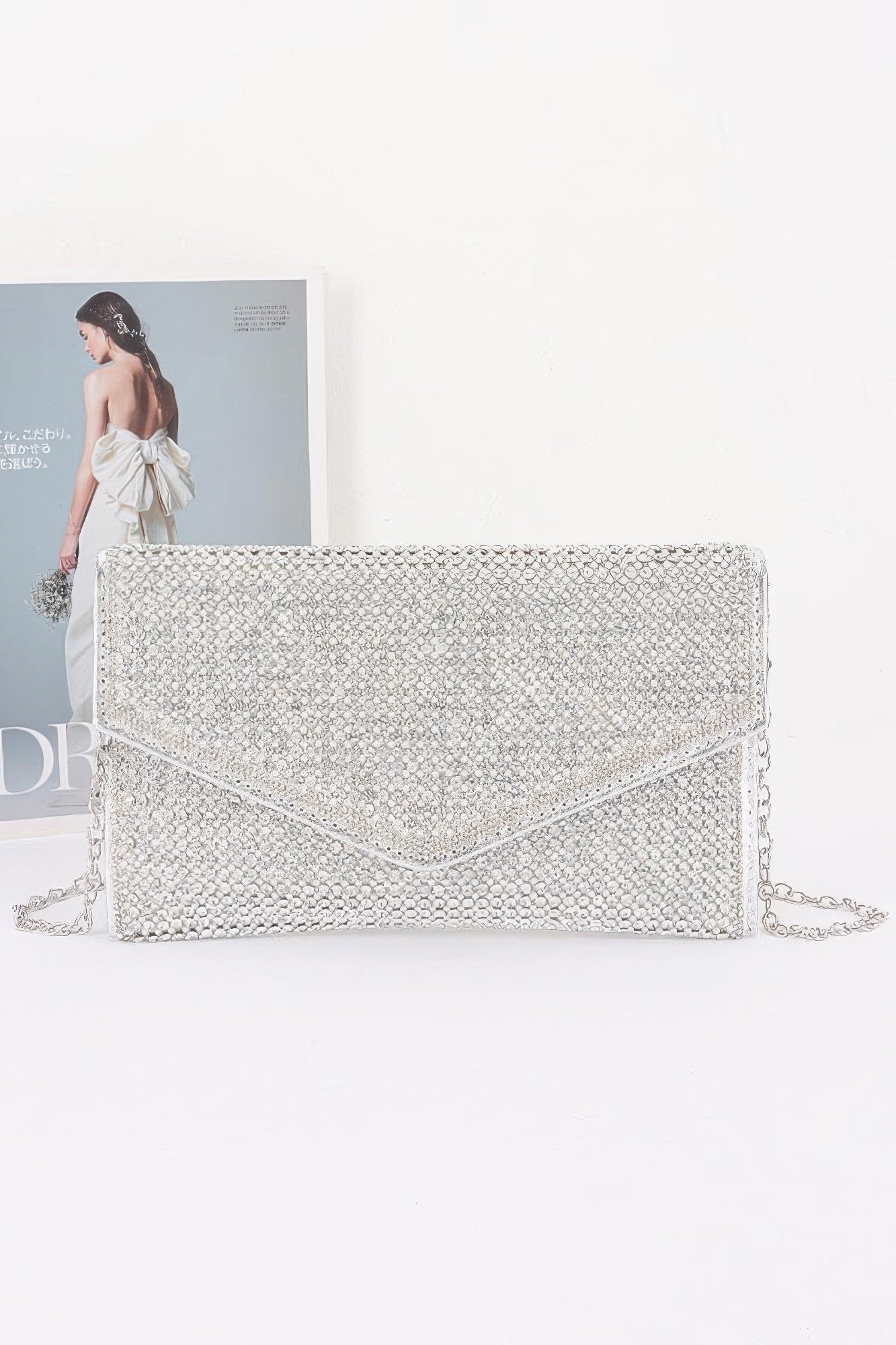 Golden Heir rhinestone pearl flap party clutch with sparkling embellishments and elegant design for special occasions.
