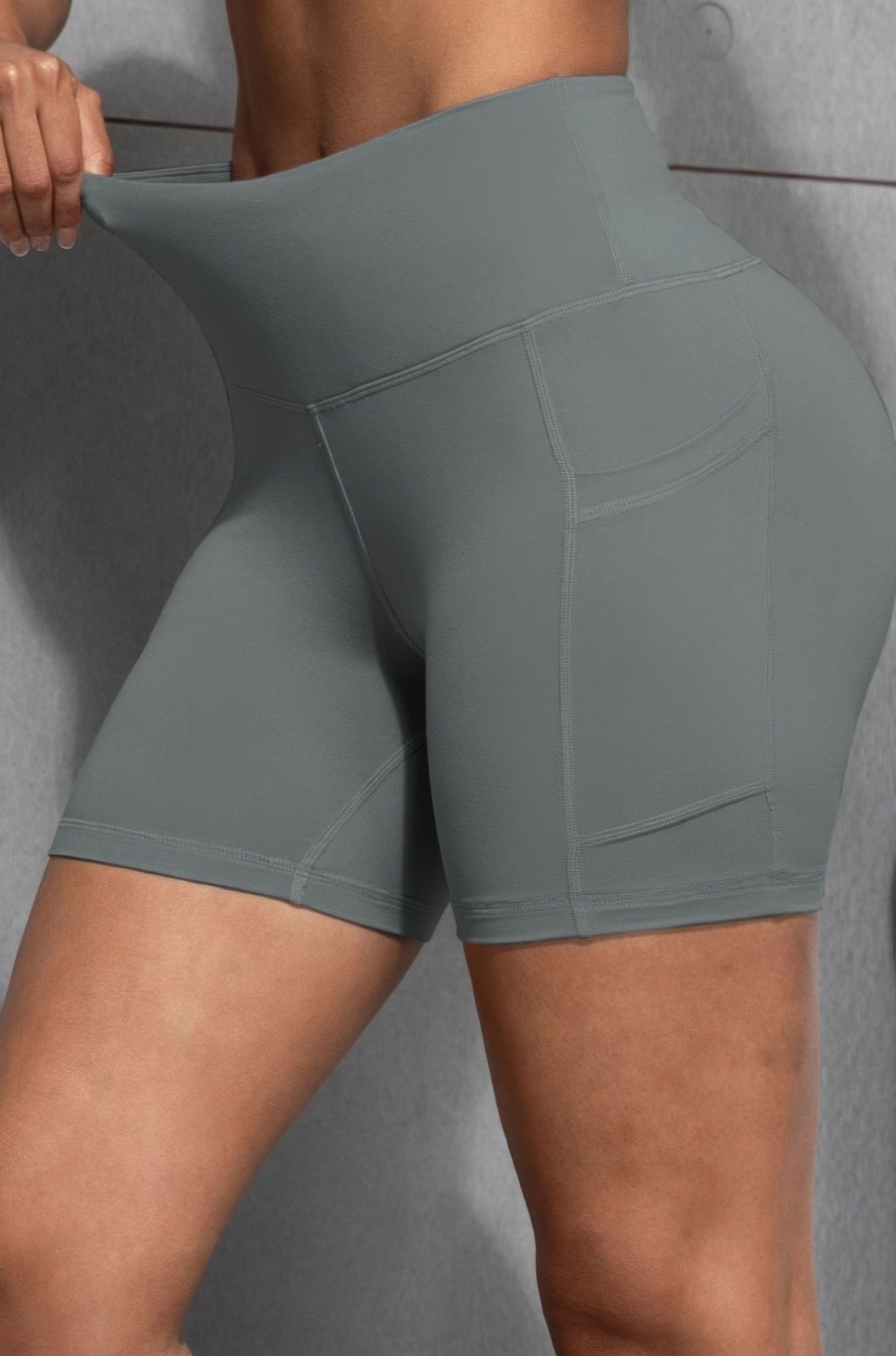 Golden Heir gray sports yoga shorts with pockets, lightweight active shorts for workouts and casual wear.