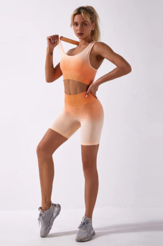 Golden Heir orange ombre seamless activewear set, two-piece workout outfit with fitted top and leggings.