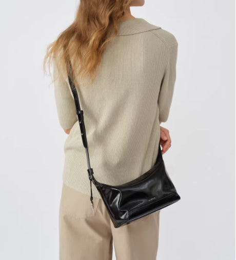 Black full-grain leather women's crossbody bag by Golden Heir, featuring a sleek design and genuine leather finish.