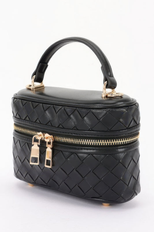 Golden Heir embossed vegan leather crossbody bag in black with gold accents, featuring a compact vanity design and adjustable strap.