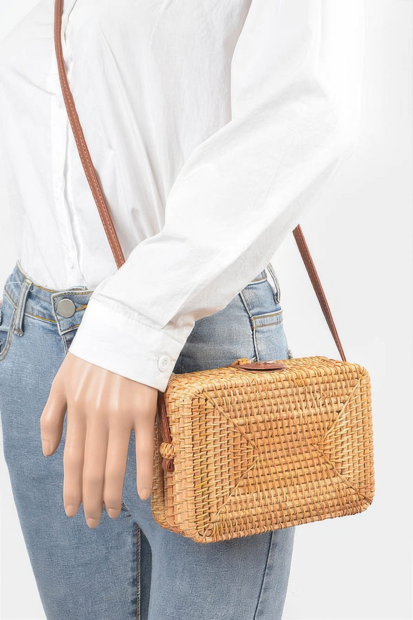Golden Heir crossbody bamboo box bag with natural finish, featuring a compact design and adjustable strap for versatile style.