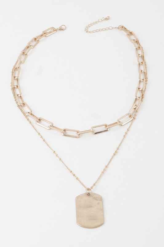 Golden Heir double layered gold tag chain necklace with sleek, stylish design, showcasing layered pendant details.