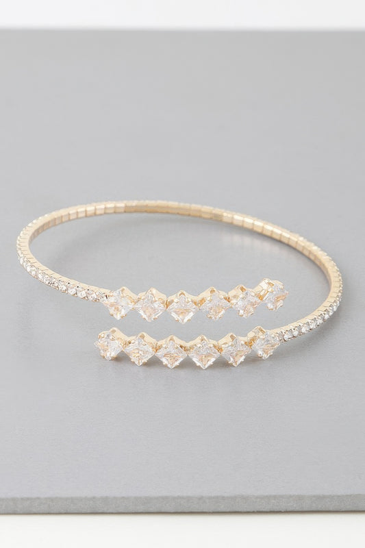 Golden Heir jeweled shiny star wrap bracelet with silver and gold accents, featuring sparkling embellishments and a stylish wrap design.