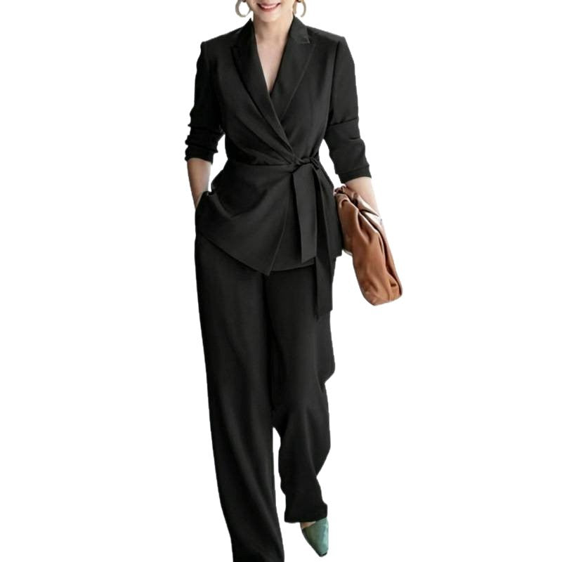 Elegant women's casual solid color suit set by eprolo, featuring a belted top and matching pants, perfect for stylish everyday wear.