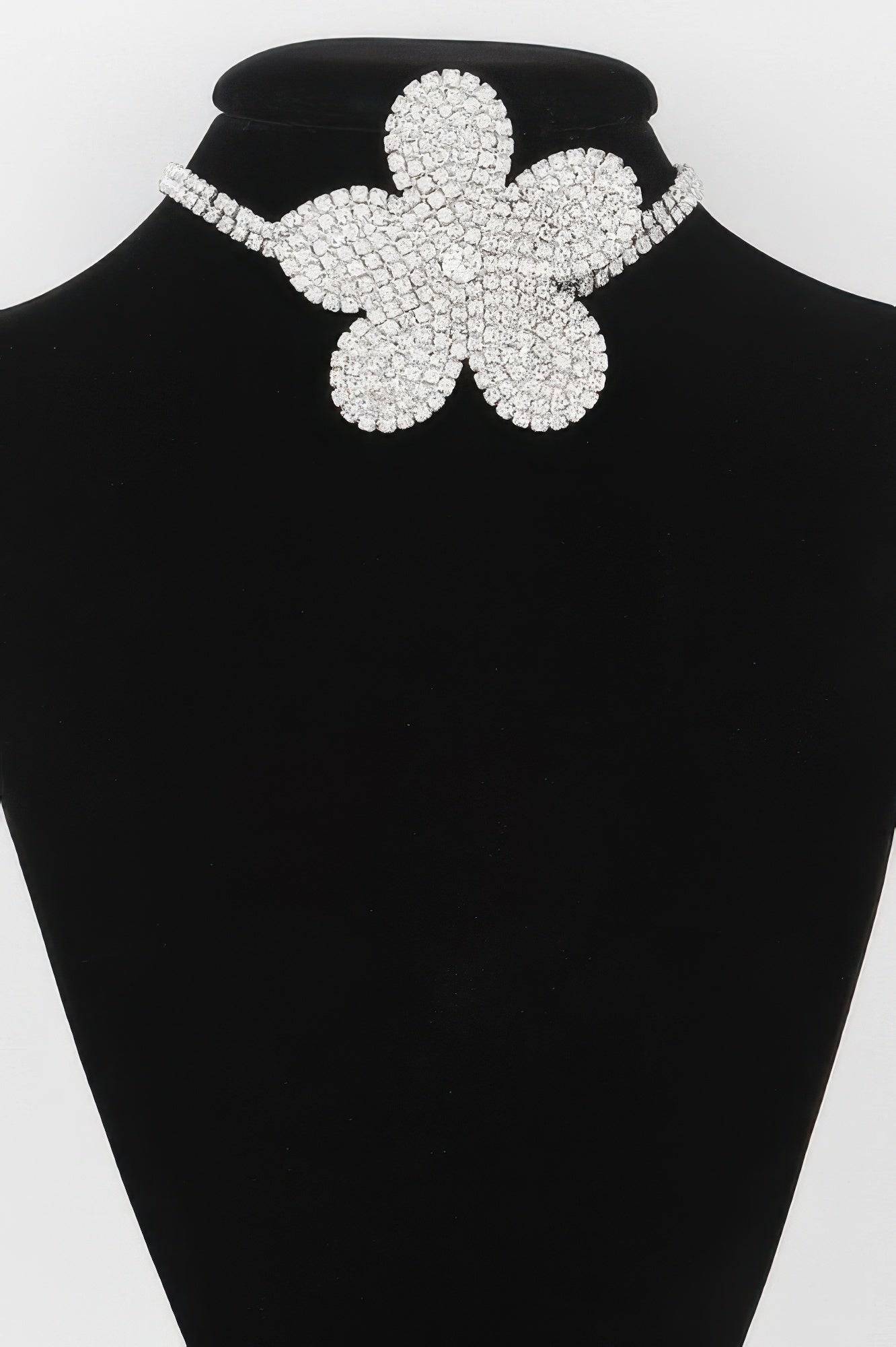 Golden Heir Flora Royale triple wrap pearl choker featuring elegant white pearls and gold accents, stylish jewelry accessory.