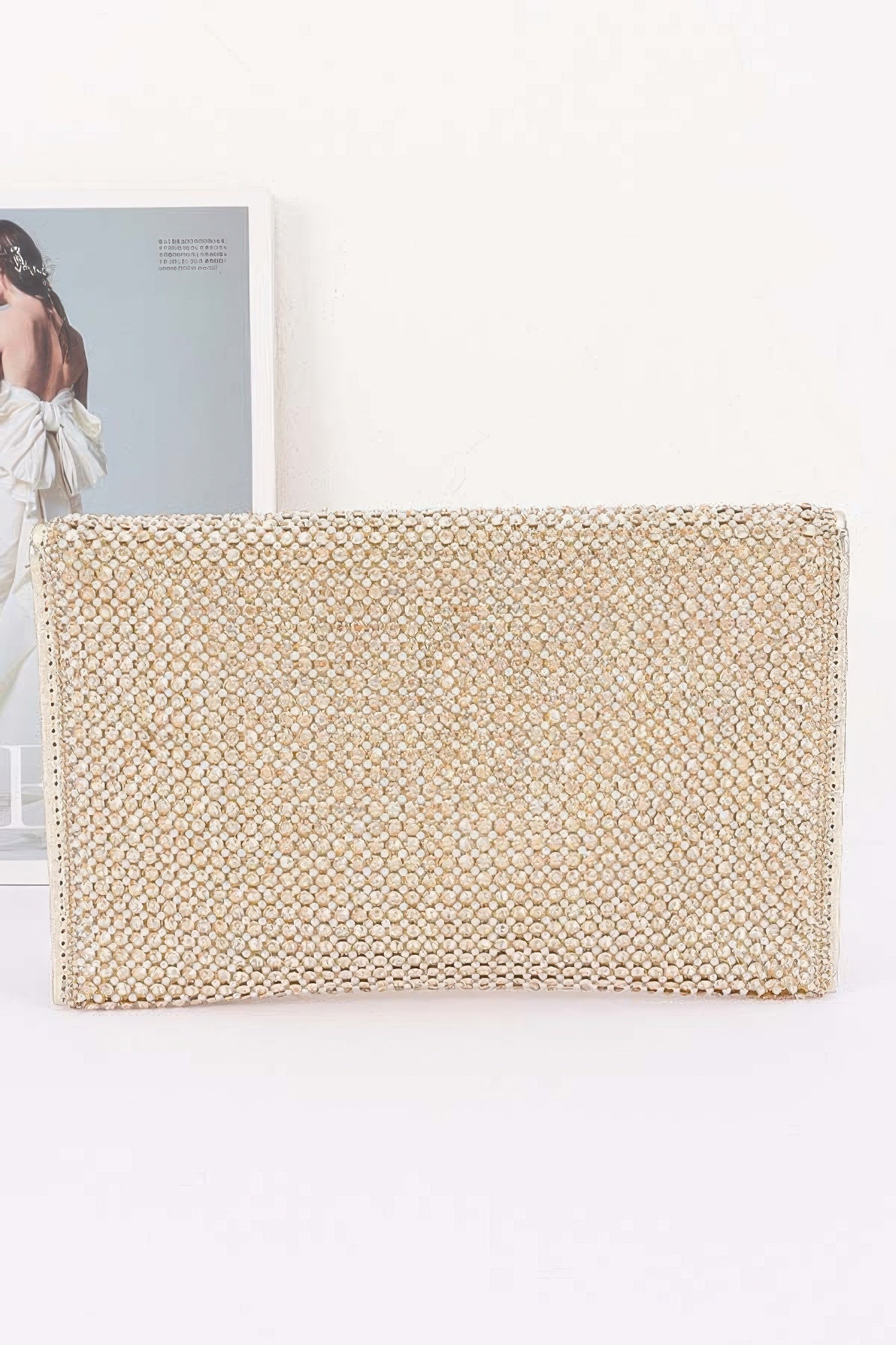 Golden Heir rhinestone pearl flap party clutch with sparkling embellishments and elegant design.