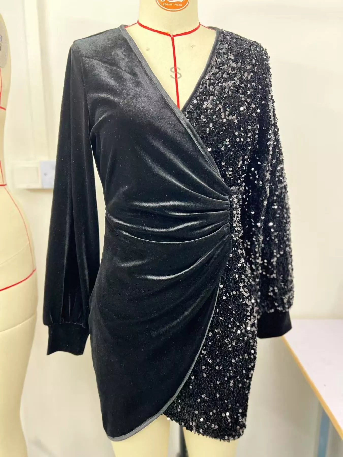 Velvet sequin long sleeve wrap dress by Trendsi featuring shimmering sequins and a fitted silhouette, perfect for elegant occasions.