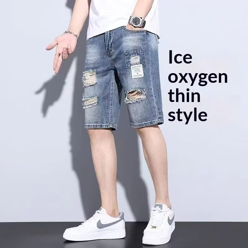 Light blue men's five-point casual ripped denim shorts from Golden Heir, styled with a relaxed fit and distressed details.