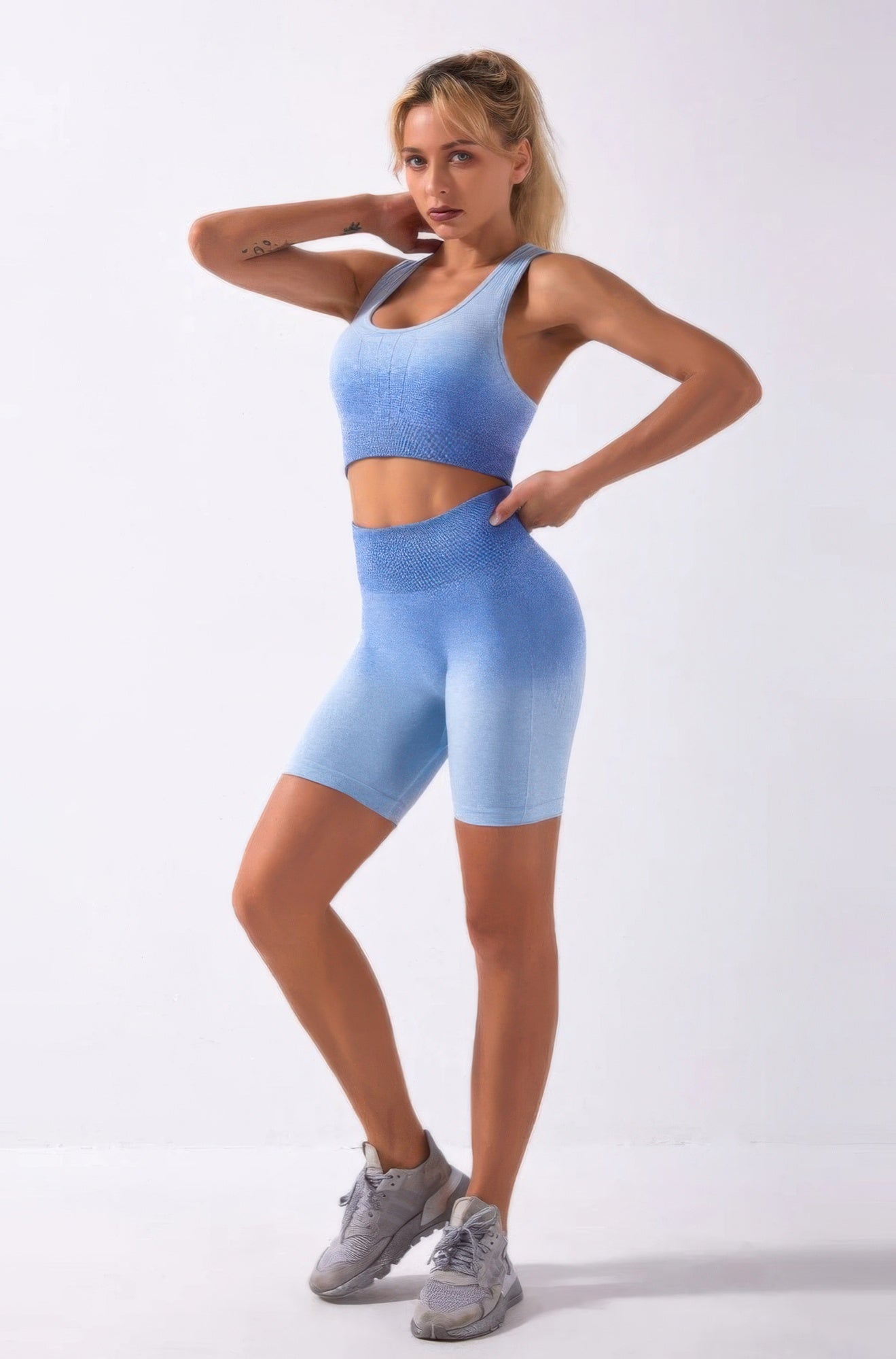 Golden Heir blue ombre seamless two-piece activewear set, featuring a fitted top and matching leggings for workout and athleisure.