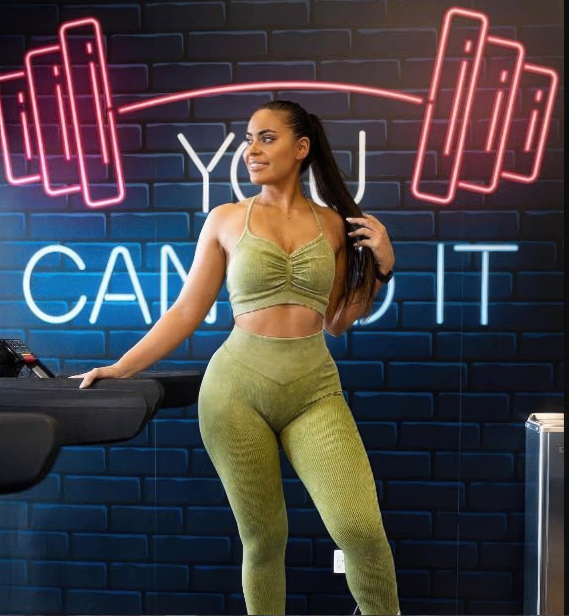 Golden Heir Sculpting Yoga Set in gold, featuring a fitted sports bra and high-waisted leggings for activewear.
