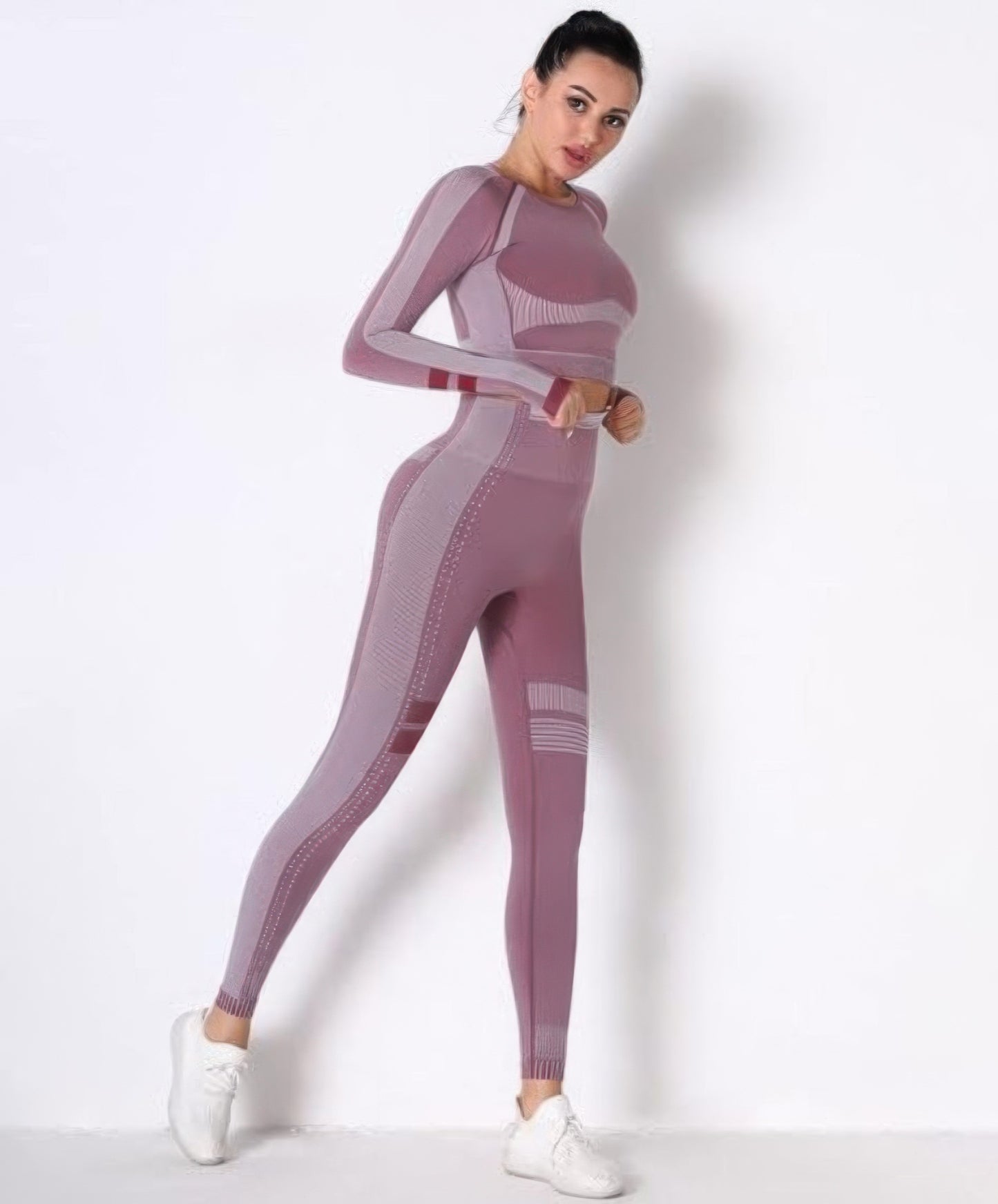 Golden Heir seamless long sleeve yoga set in berry color, featuring a fitted activewear top and matching leggings for comfortable movement.