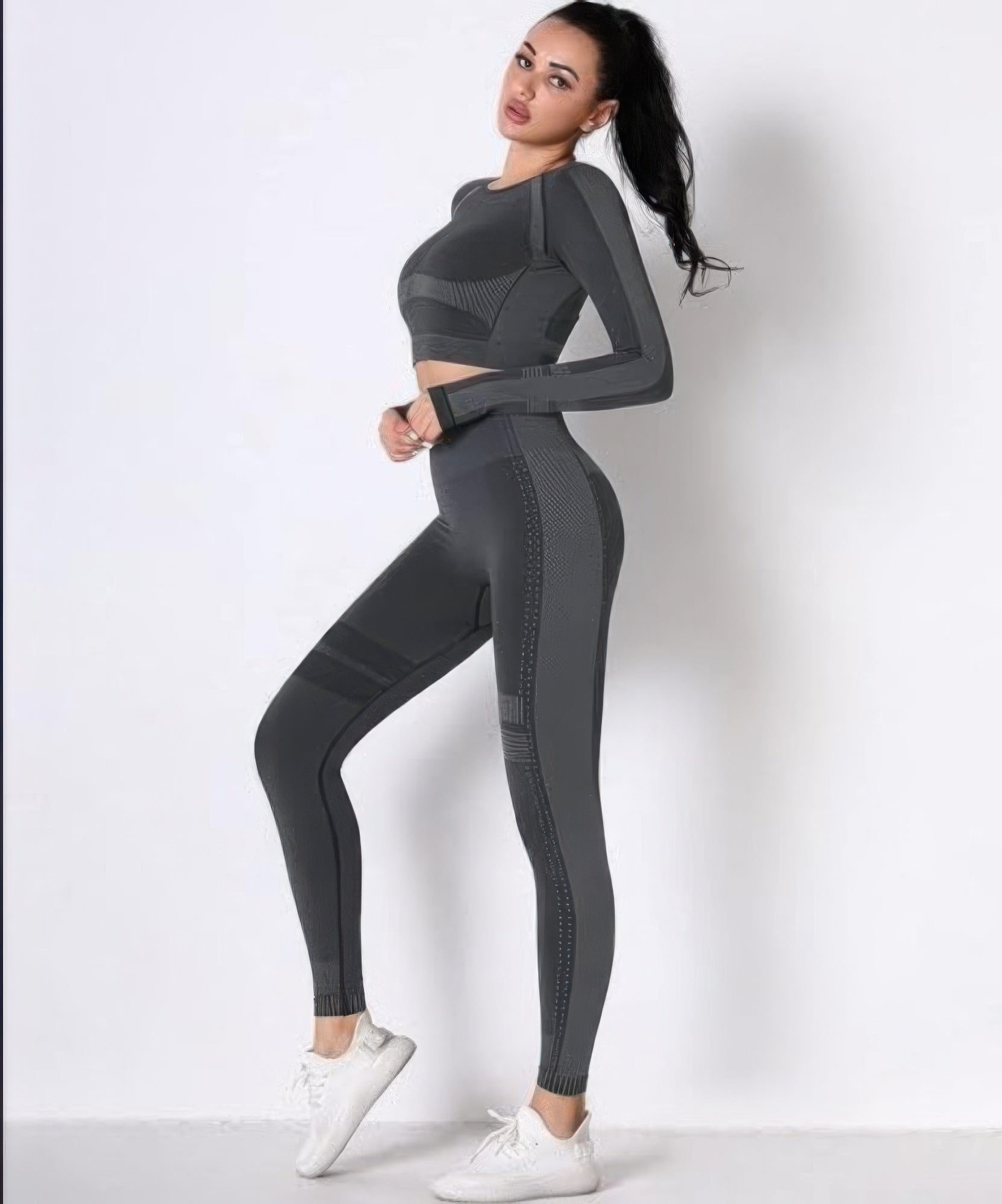 Golden Heir seamless long sleeve yoga set in dark gray, includes fitted top and matching leggings for activewear and yoga.