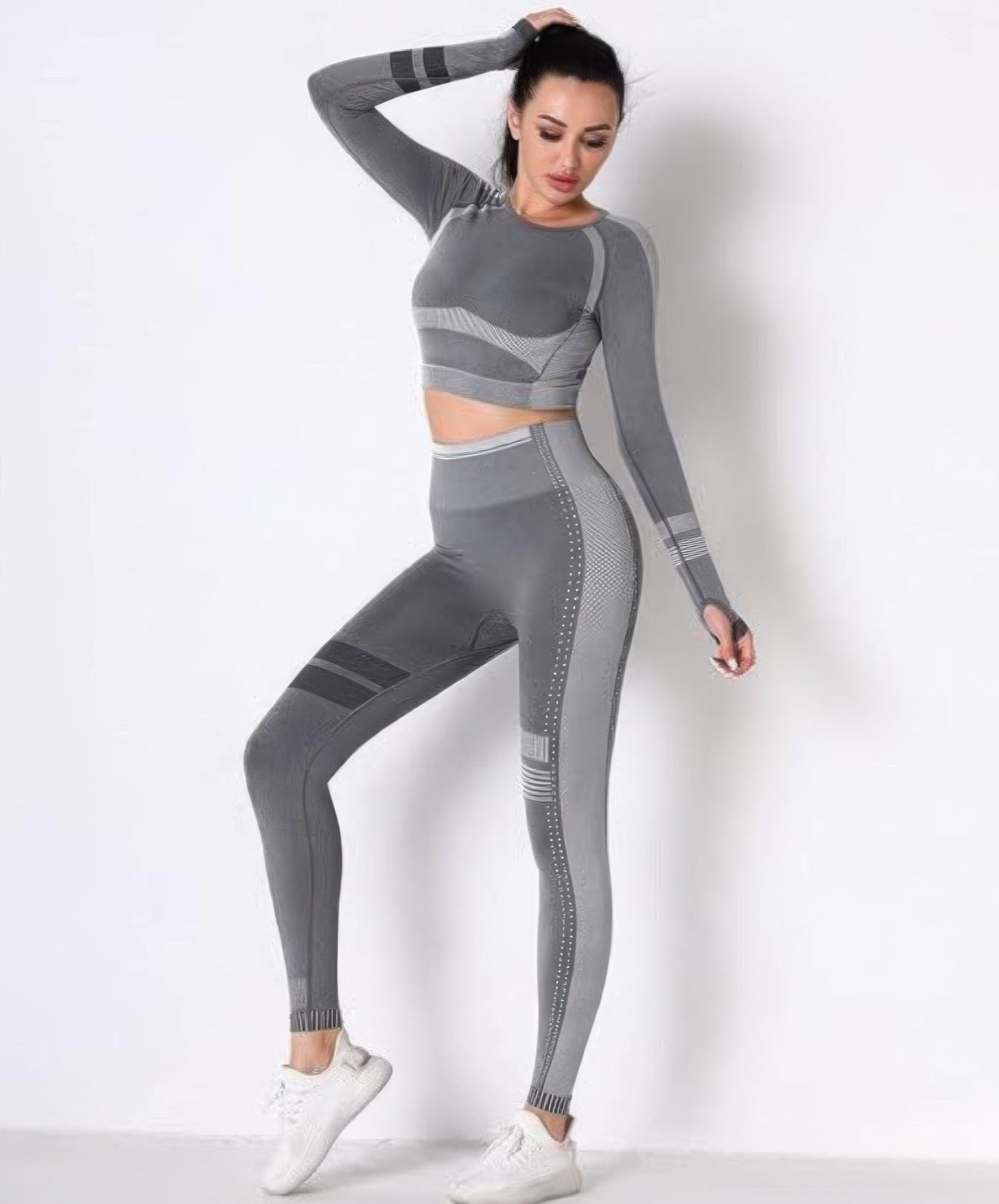 Golden Heir seamless long sleeve yoga set in gray, featuring comfortable activewear with a sleek, fitted design for yoga and workouts.