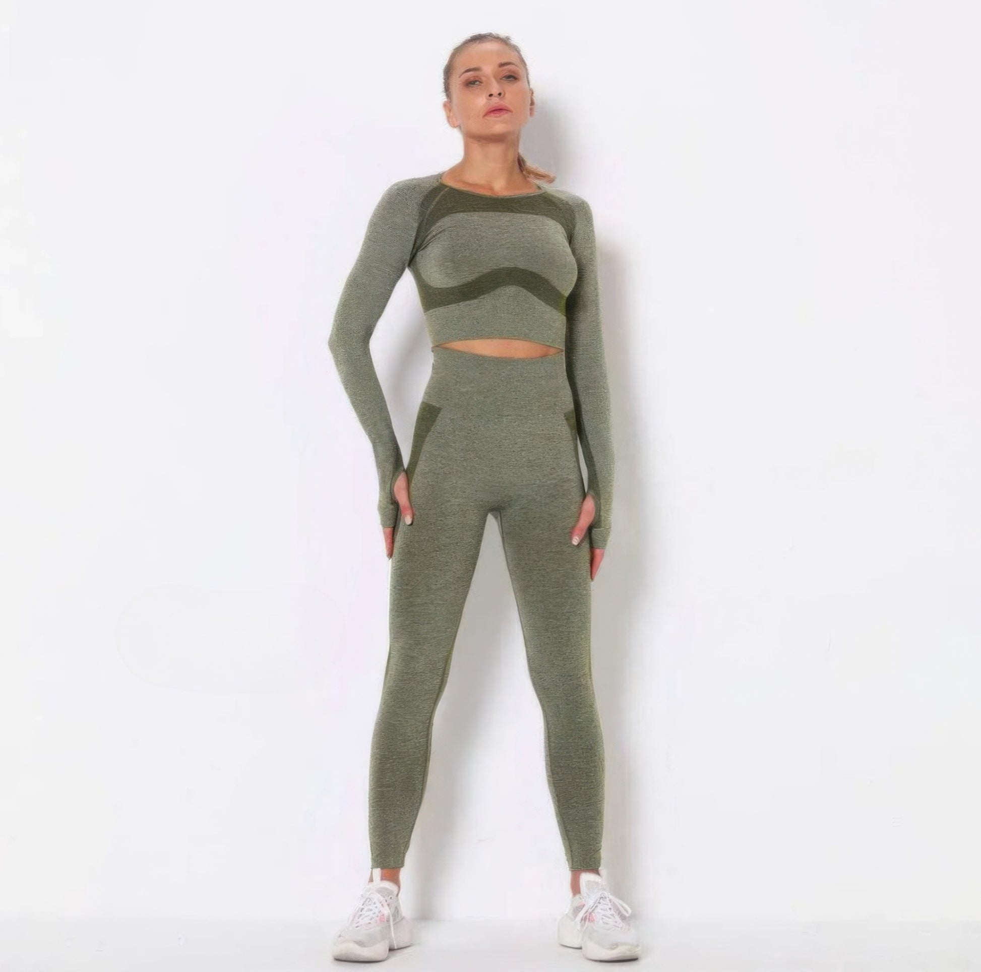 Green Golden Heir seamless long sleeve yoga set, activewear designed for comfort and flexibility during exercise.