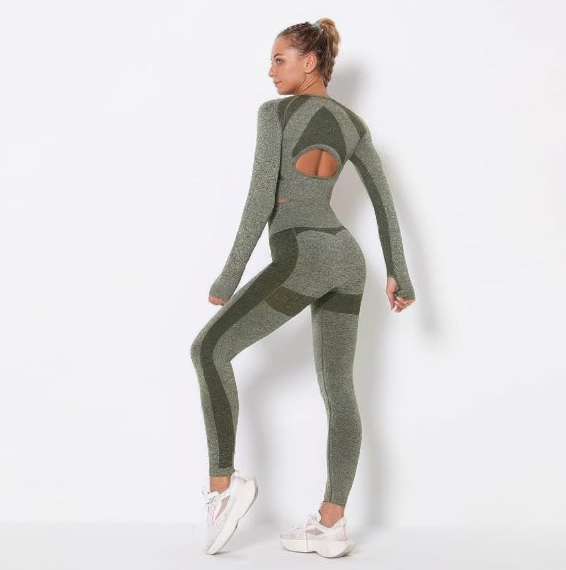 Golden Heir seamless long sleeve yoga set in green, shown on model, featuring fitted activewear designed for comfortable movement.