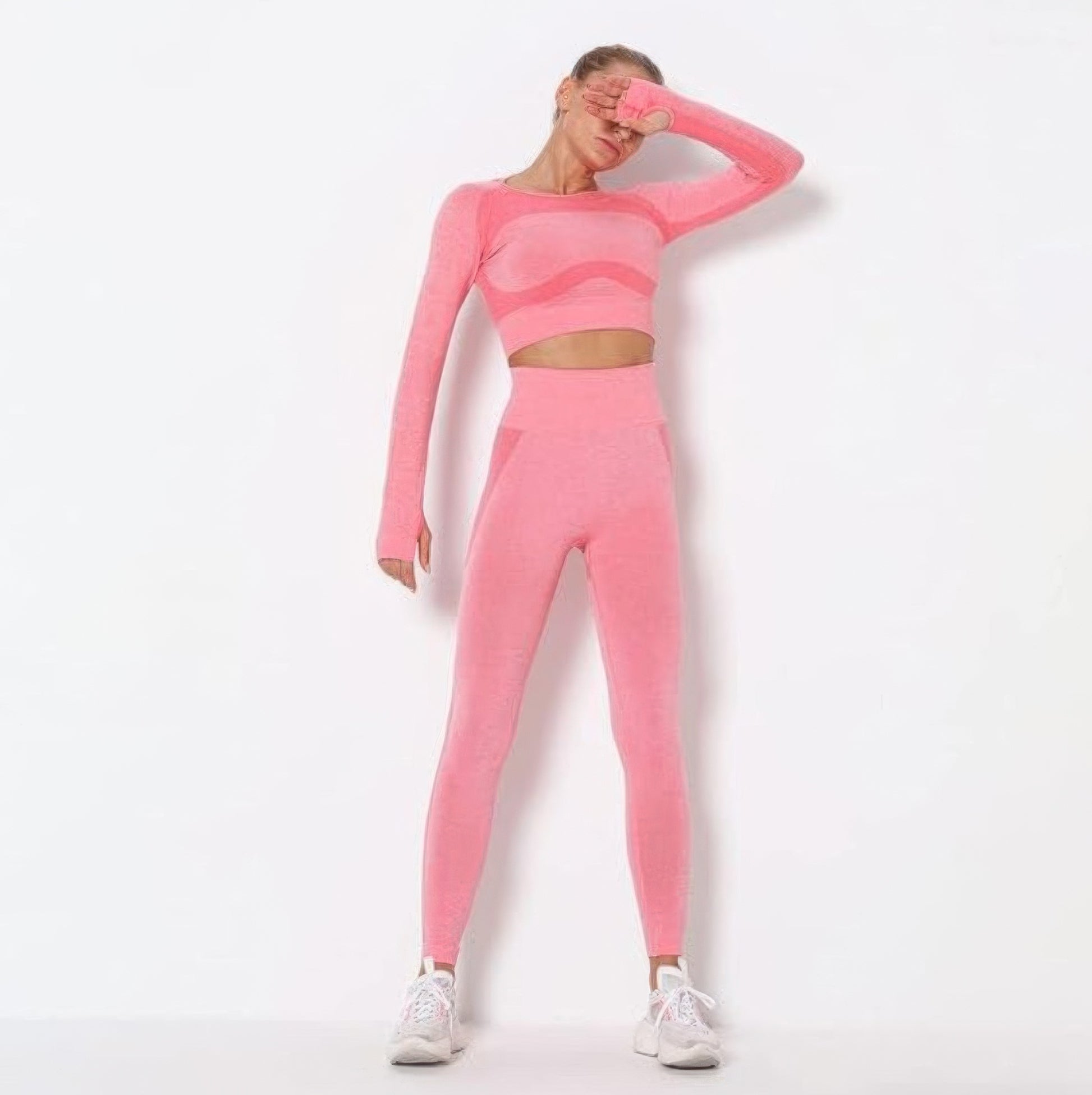 Golden Heir pink seamless long sleeve yoga set, activewear ensemble with fitted top and matching leggings for workout and yoga.