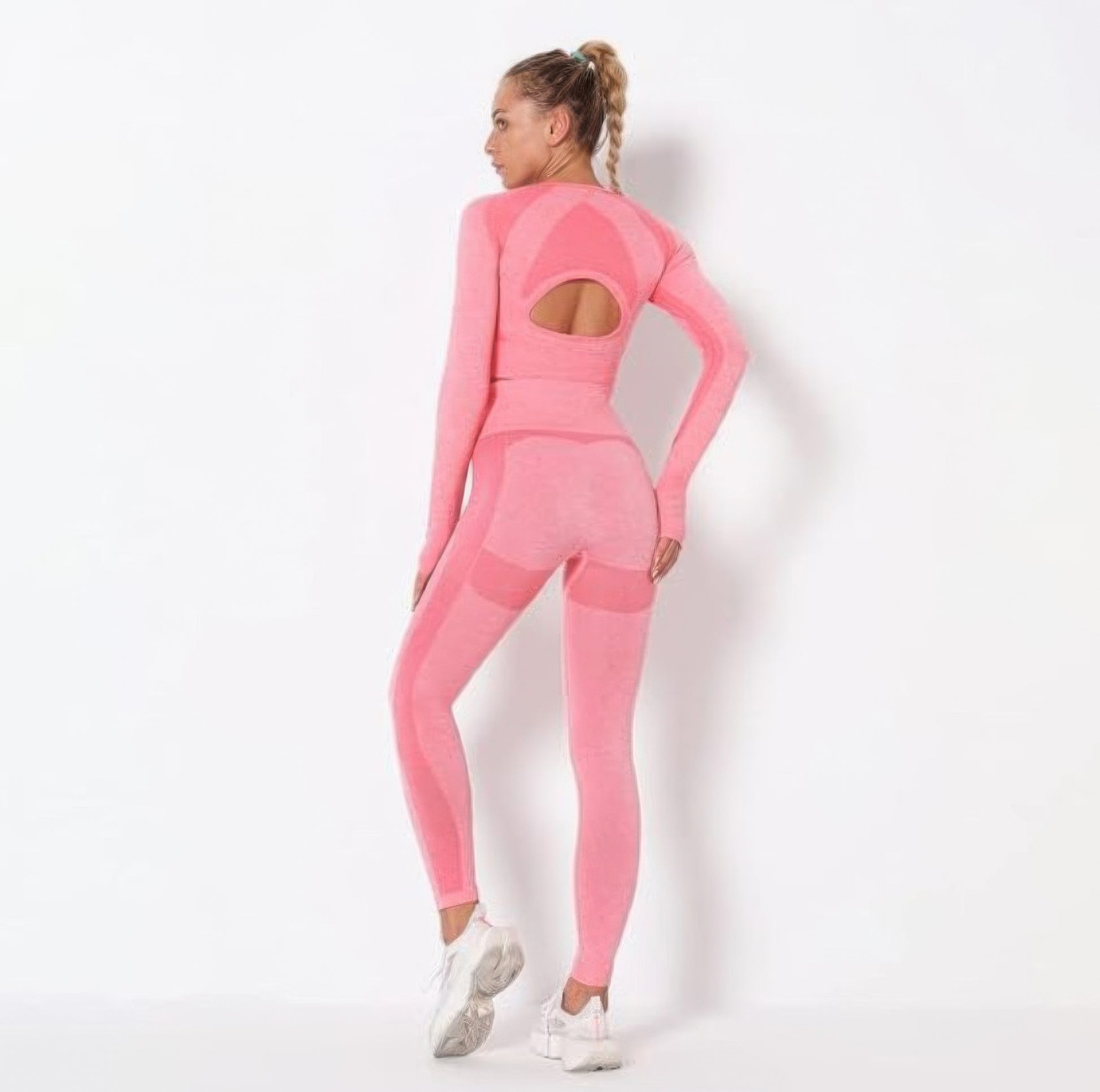 Pink Golden Heir seamless long sleeve yoga set with fitted design, ideal for activewear and yoga practice.