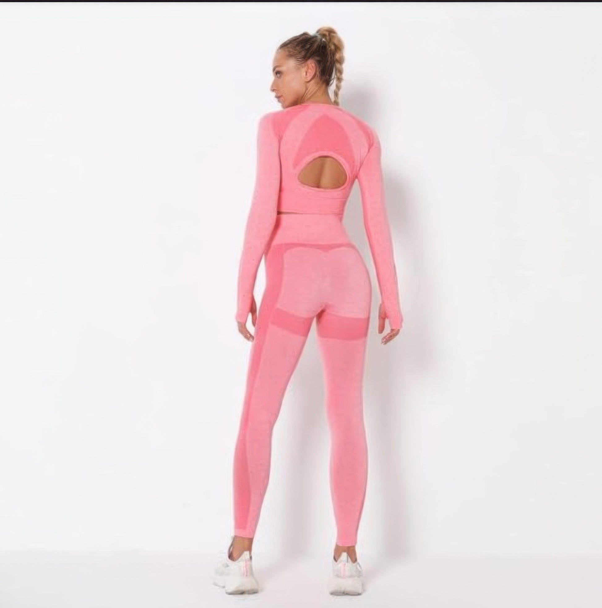 Golden Heir pink seamless long sleeve yoga set, activewear ensemble with fitted top and matching leggings for workout or casual wear.