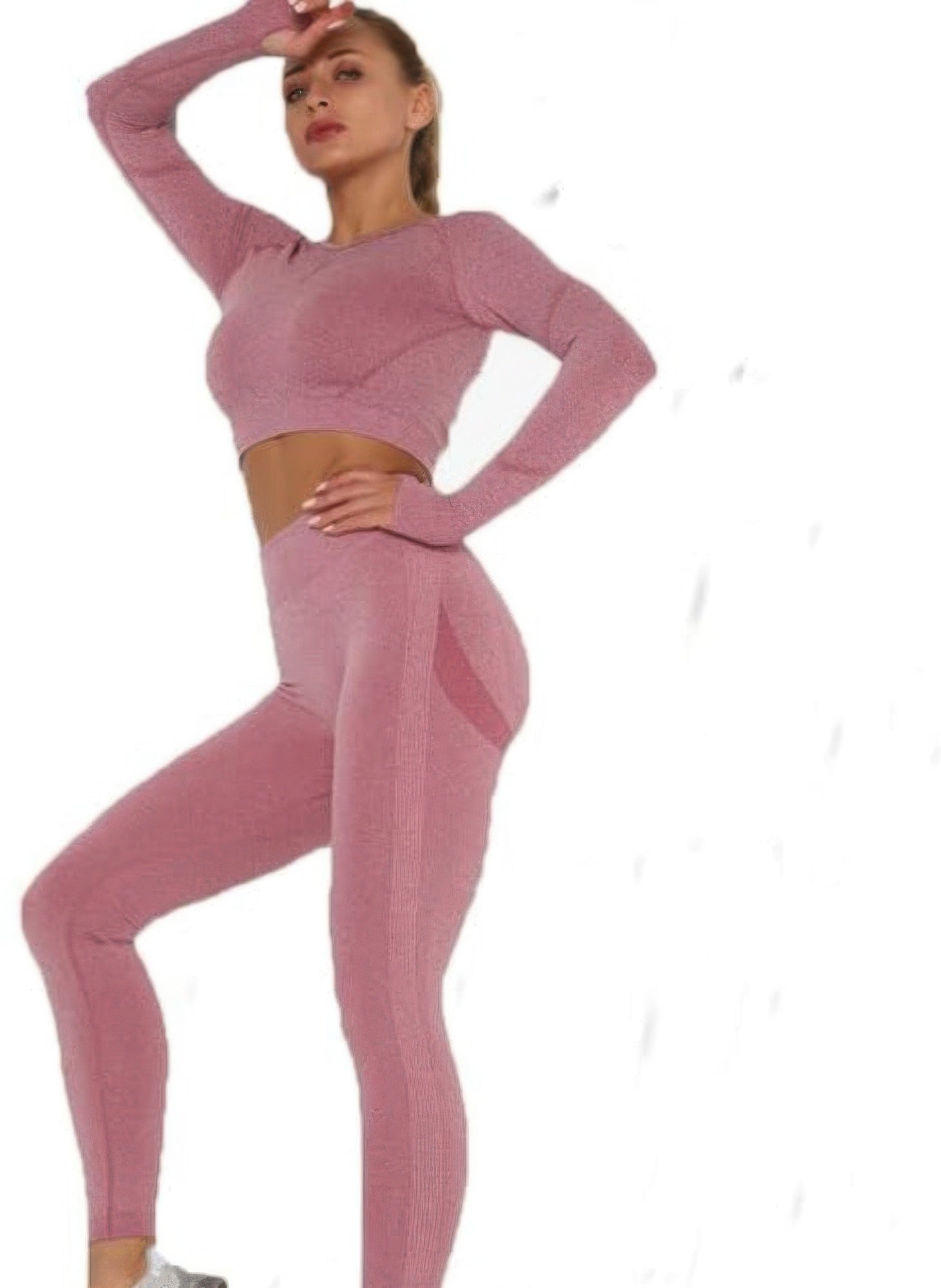 Golden Heir pink seamless activewear set featuring a fitted top and matching leggings, ideal for workout and athletic wear.