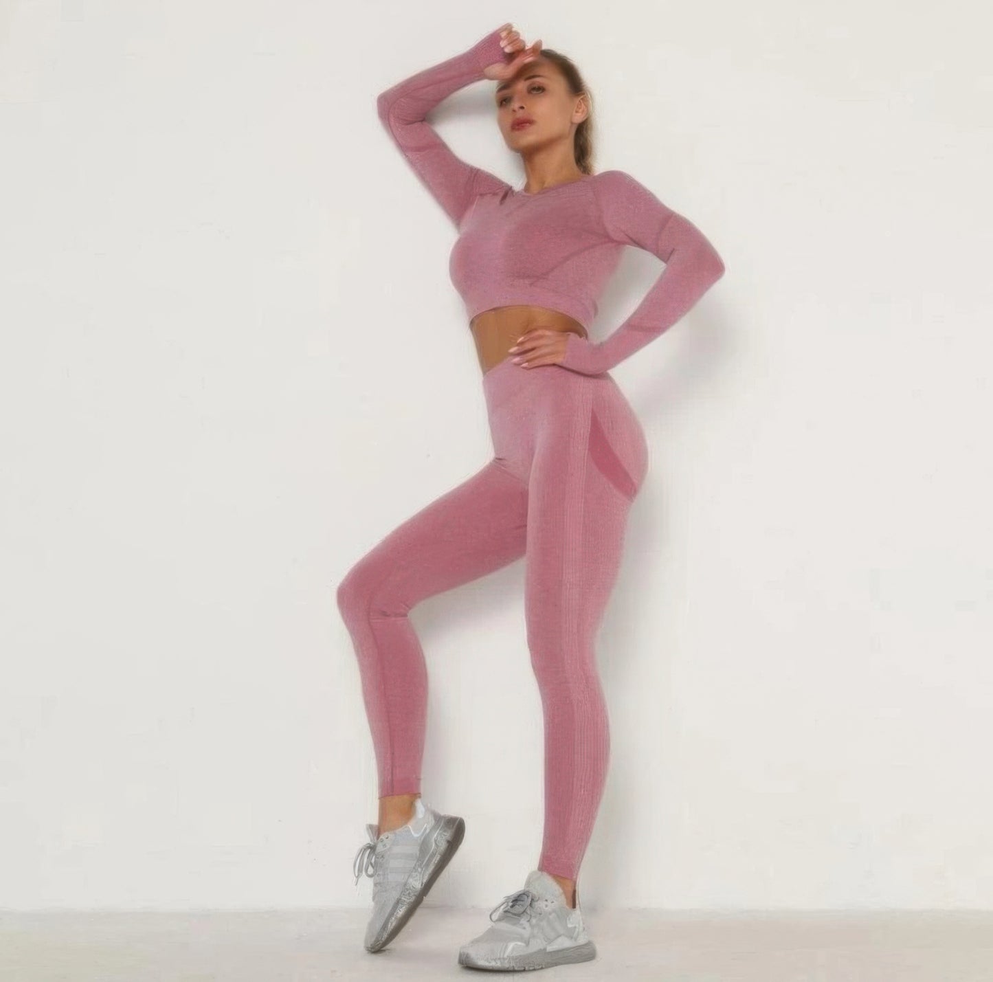 Golden Heir pink seamless activewear set with top and leggings, designed for comfort and style during workouts.