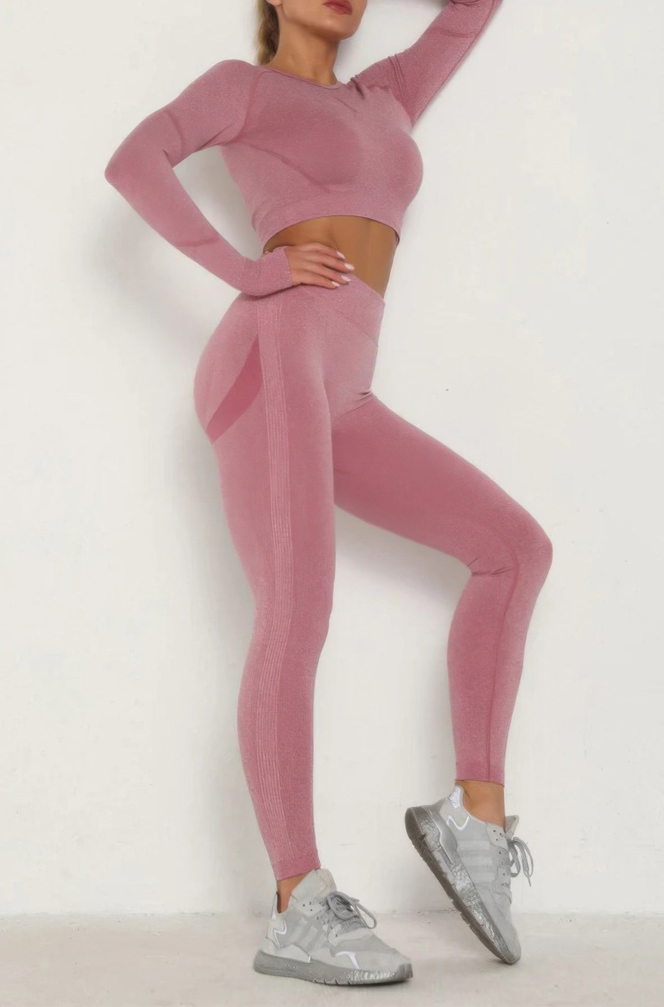 Golden Heir seamless pink activewear set featuring a fitted top and matching leggings for workout and casual wear.