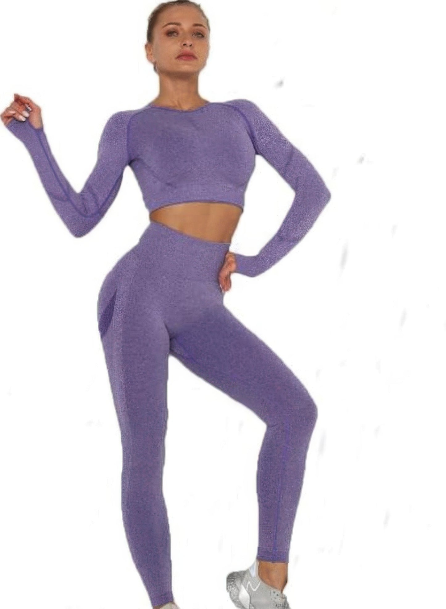 Golden Heir purple seamless activewear set featuring a fitted top and matching leggings, ideal for workouts and athleisure.