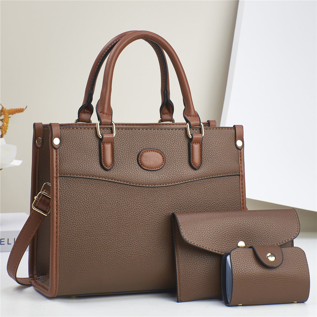 Golden Heir stylish three-piece shoulder bag set for women and mother-and-child bags, featuring apricot-colored bags with multiple compartments.