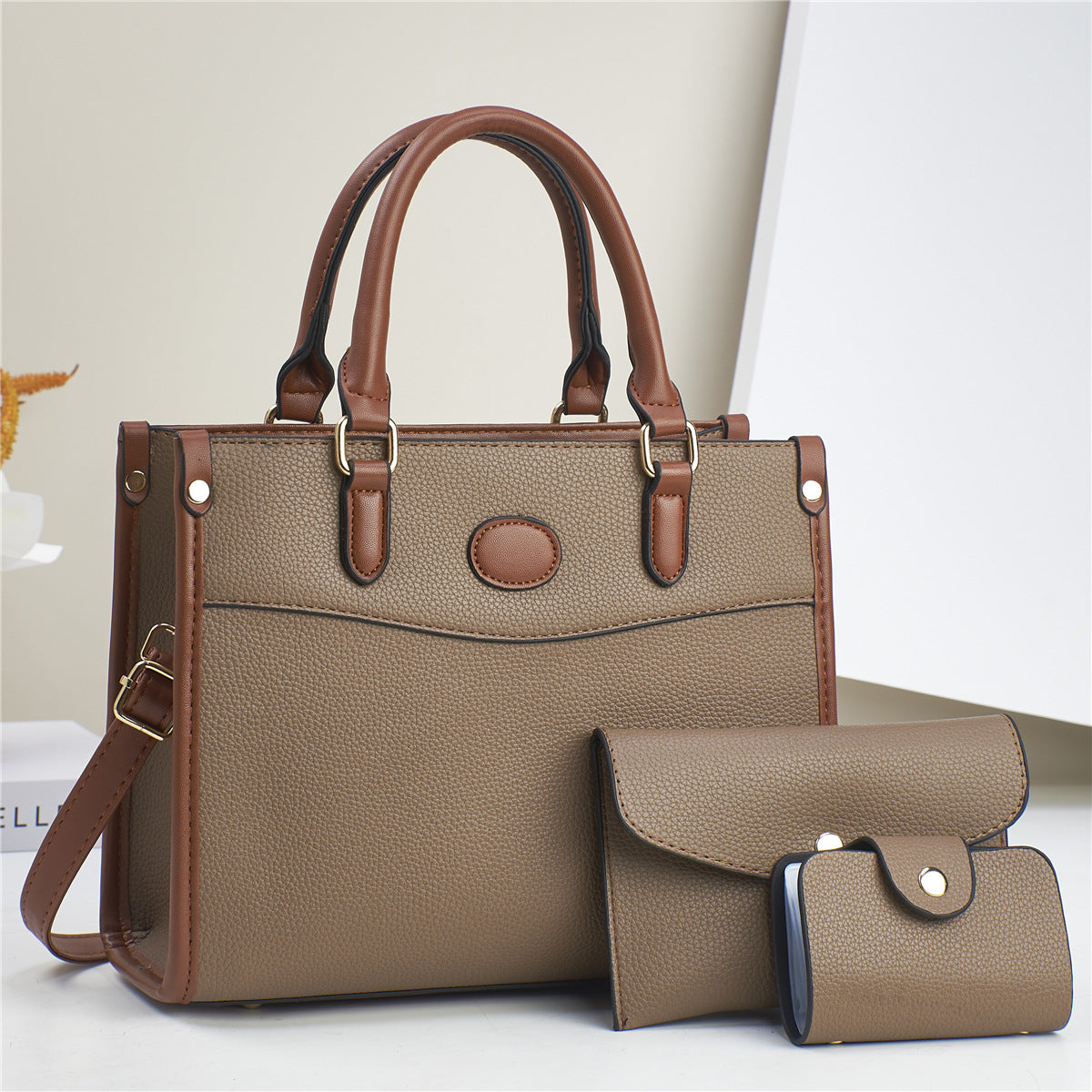 Golden Heir stylish three-piece shoulder bag set for women and mother-and-child, featuring apricot-colored bags with versatile design.