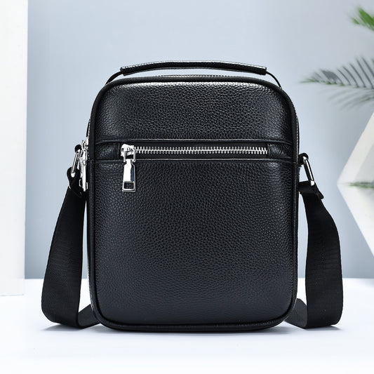 Black men's crossbody bag made from first-layer cowhide leather by Golden Heir, featuring a compact design and adjustable strap.