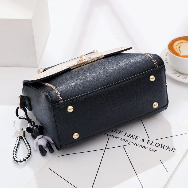 Black embroidered lace crossbody bag for women by Golden Heir, featuring intricate lace detailing and a stylish, versatile design.
