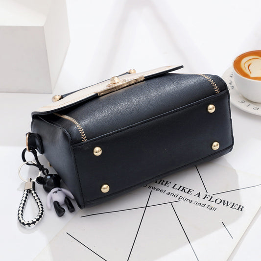 Black embroidered lace crossbody bag for women by Golden Heir, featuring intricate lace detailing and a stylish, versatile design.