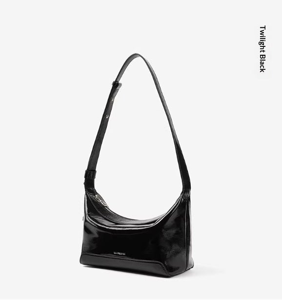 Black full-grain leather women's crossbody bag with a genuine leather finish, designed by Golden Heir.
