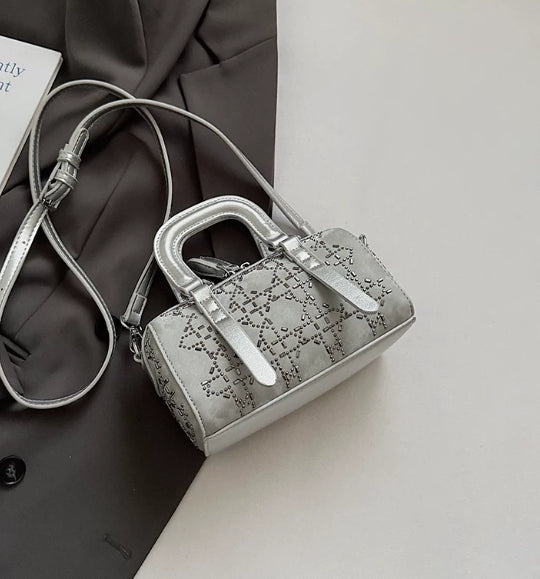 Black Korean-style minimalist cylindrical tote bag by Golden Heir with a pendant, versatile for everyday use.