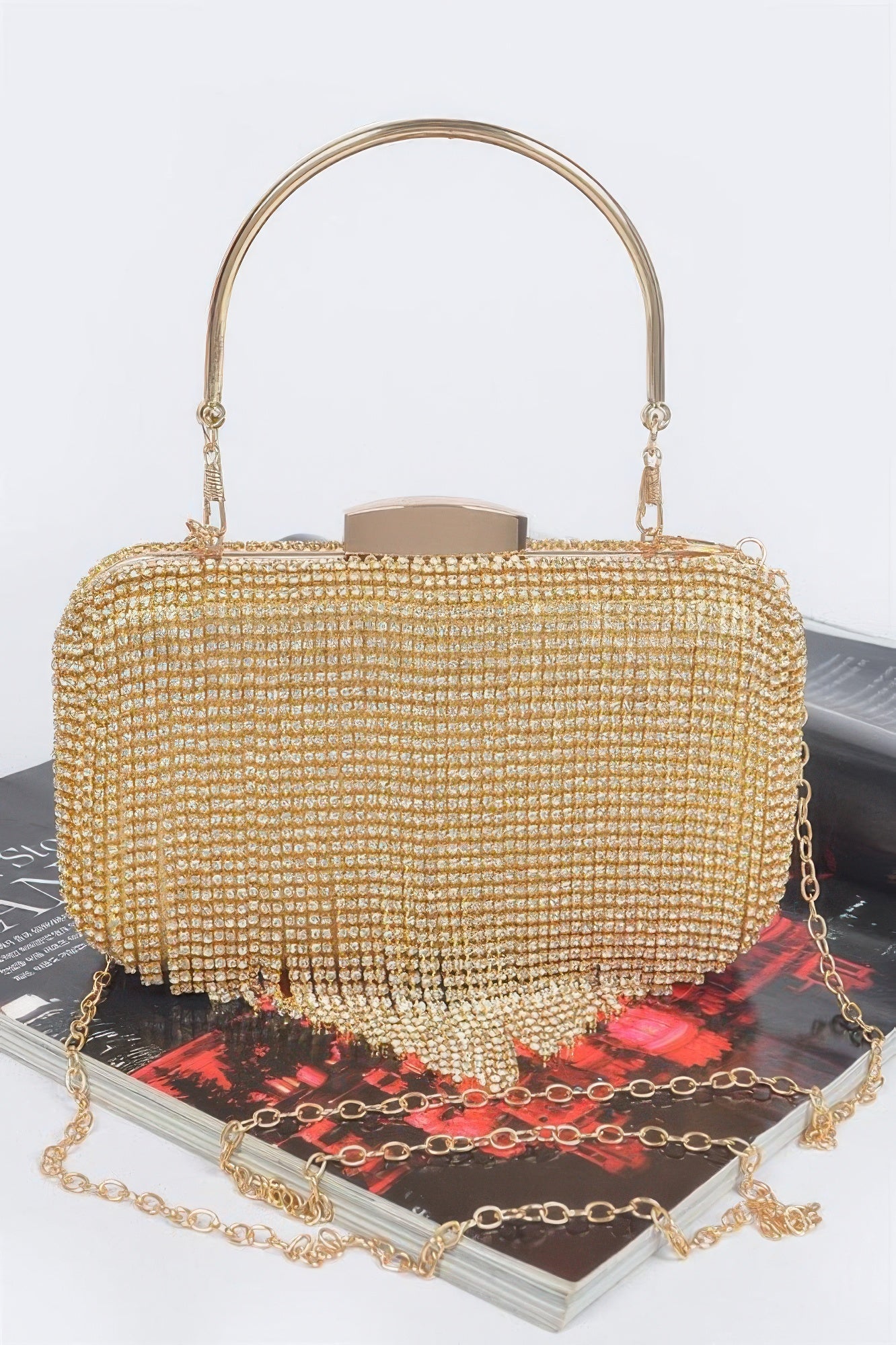 Black Golden Heir rhinestone fringe hard clutch bag with sparkling embellishments and a sleek, structured design.
