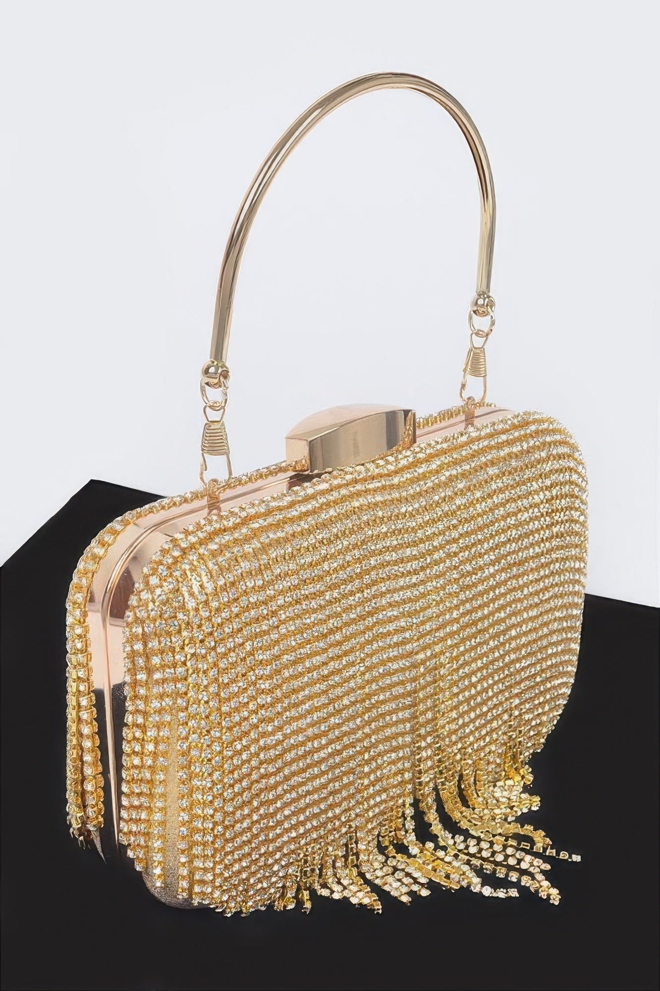 Black Golden Heir rhinestone fringe hard clutch bag with sparkling embellishments and a sleek rectangular design.
