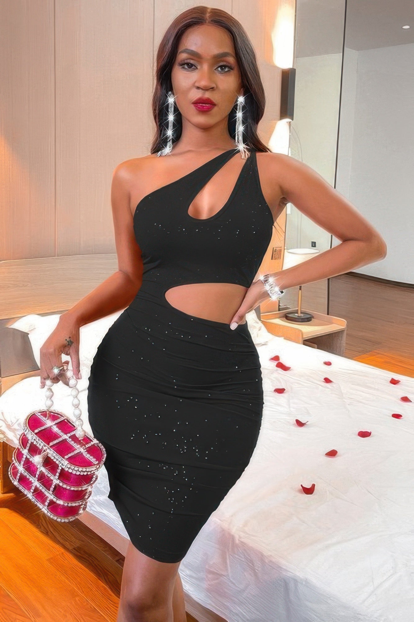 Black Golden Heir one-shoulder bodycon dress with sculpted fit, showcasing a sleek and elegant design.