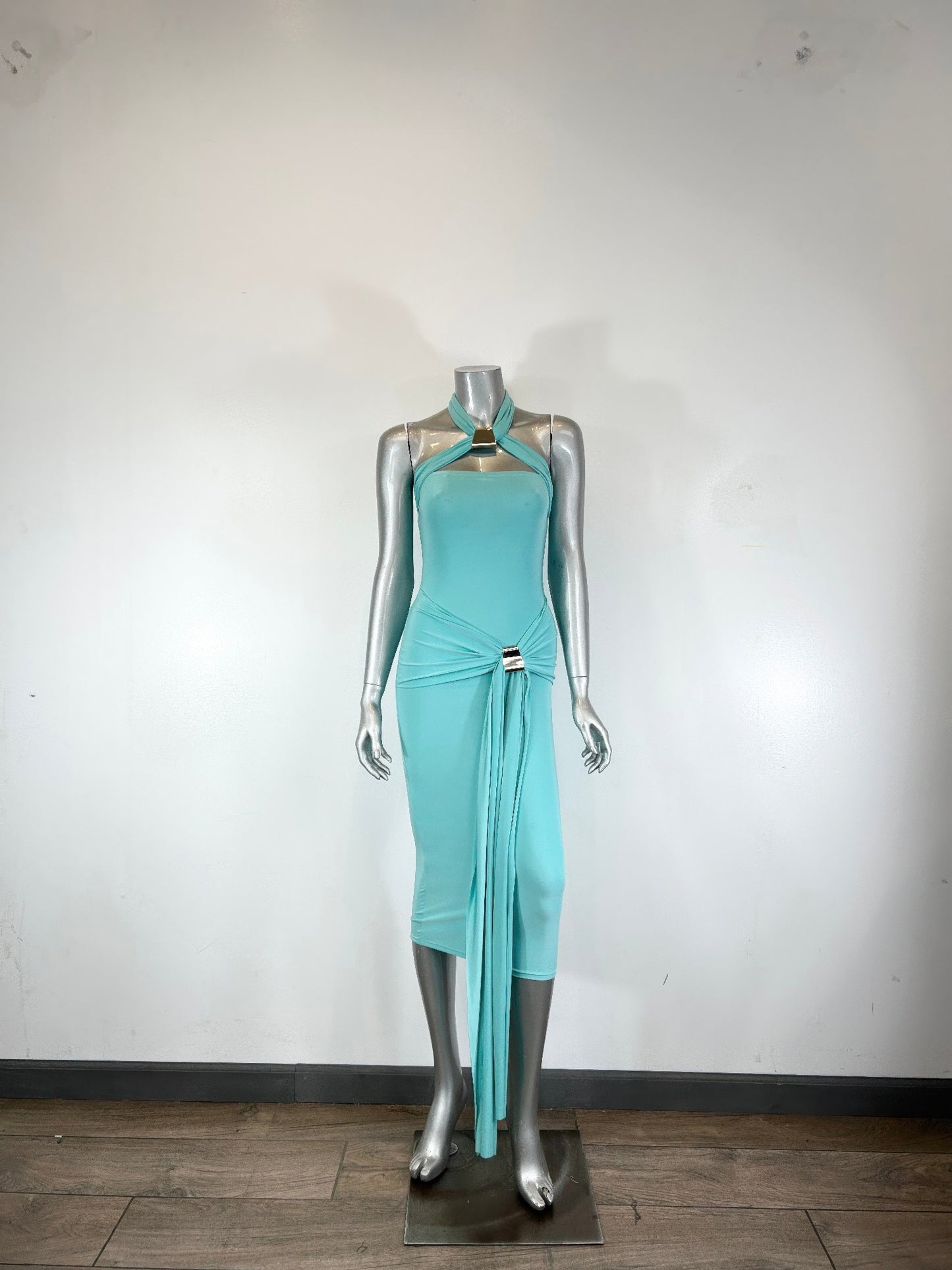 Mint green Golden Heir halter style bodycon midi dress displayed on a model, showcasing its sleek fit and elegant design.