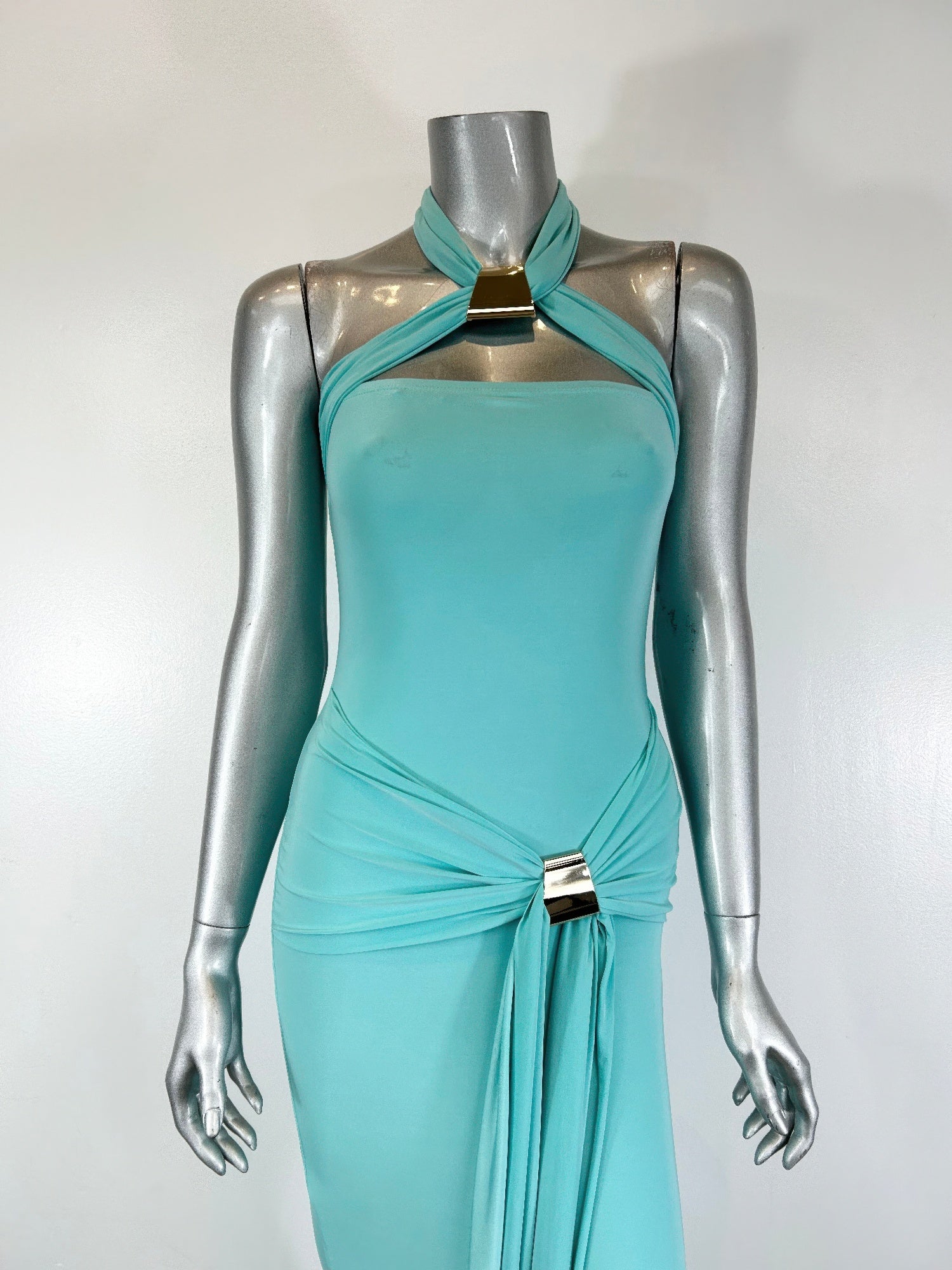 Mint green halter-style bodycon midi dress by Golden Heir, form-fitting design with sleek silhouette and elegant style.