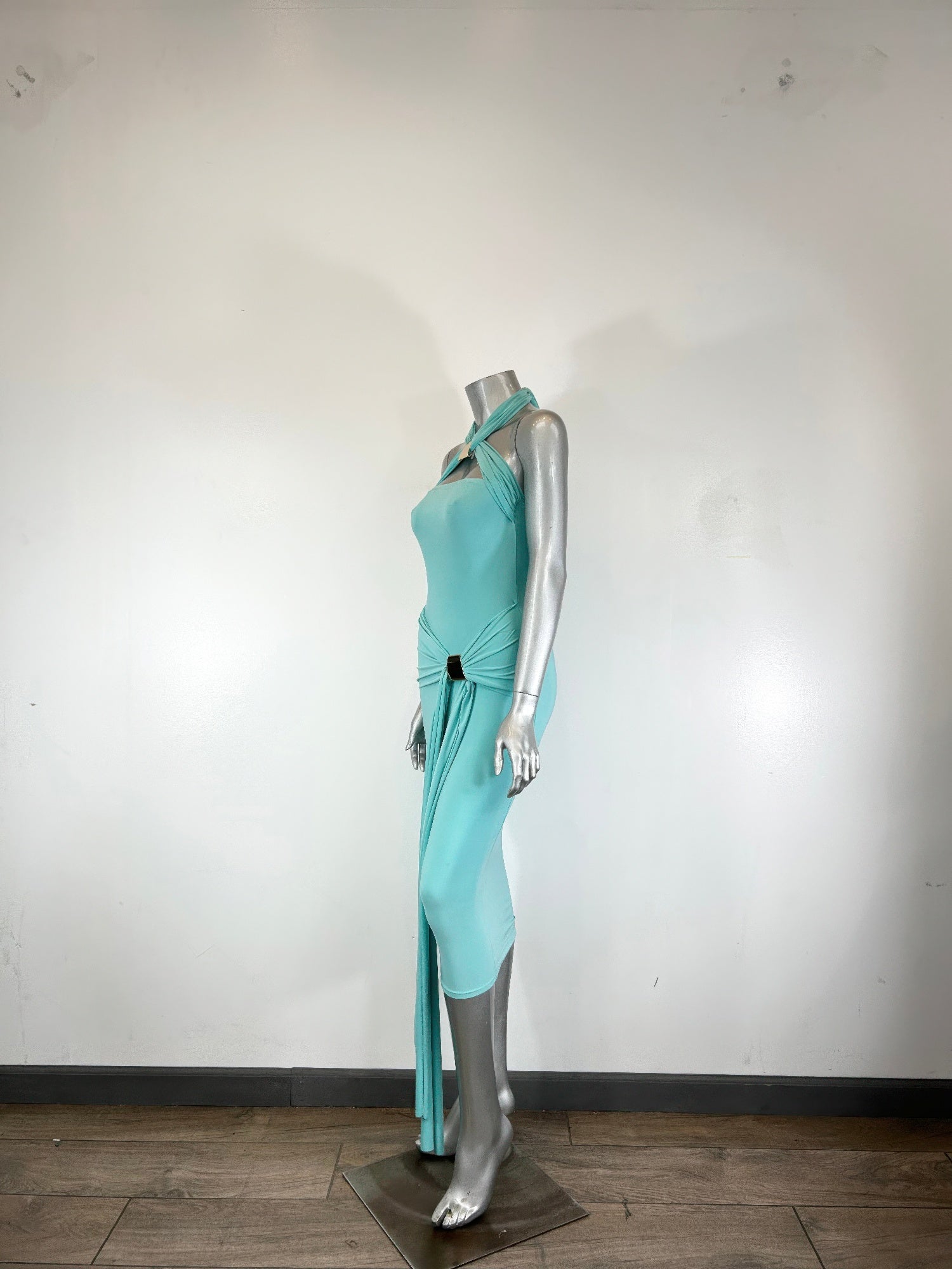 Mint green halter-style bodycon midi dress by Golden Heir, fitted design with sleek fabric and elegant silhouette.