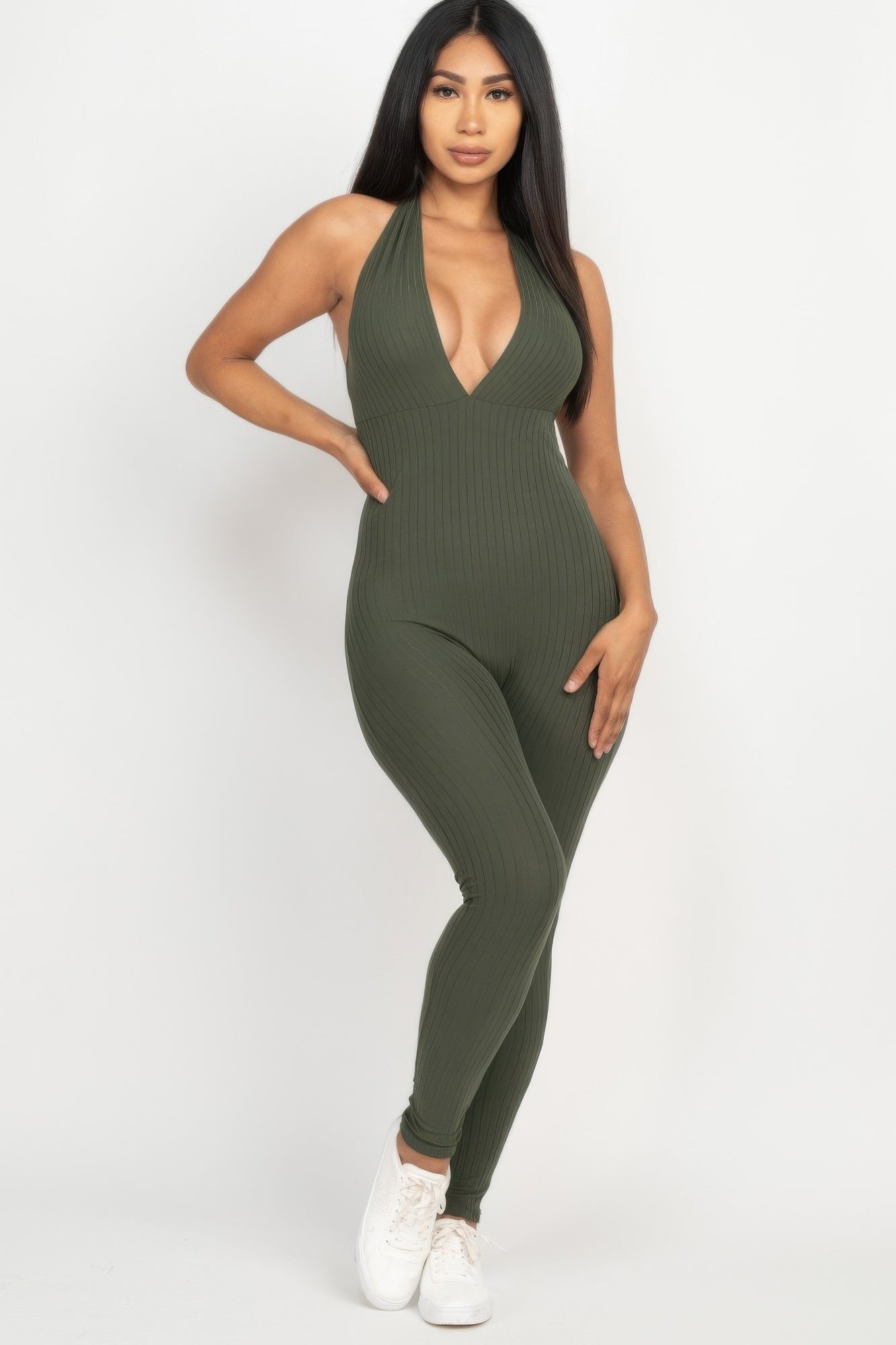 Golden Heir halter V-neck ribbed bodycon jumpsuit with a fitted silhouette, shown in a vibrant berry color.