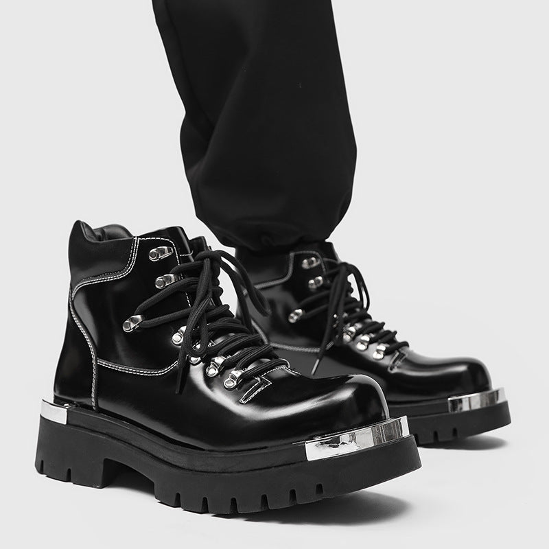Men's black Golden Heir chunky-soled Dr Martens boots with sturdy design and versatile style, shown on a plain background.