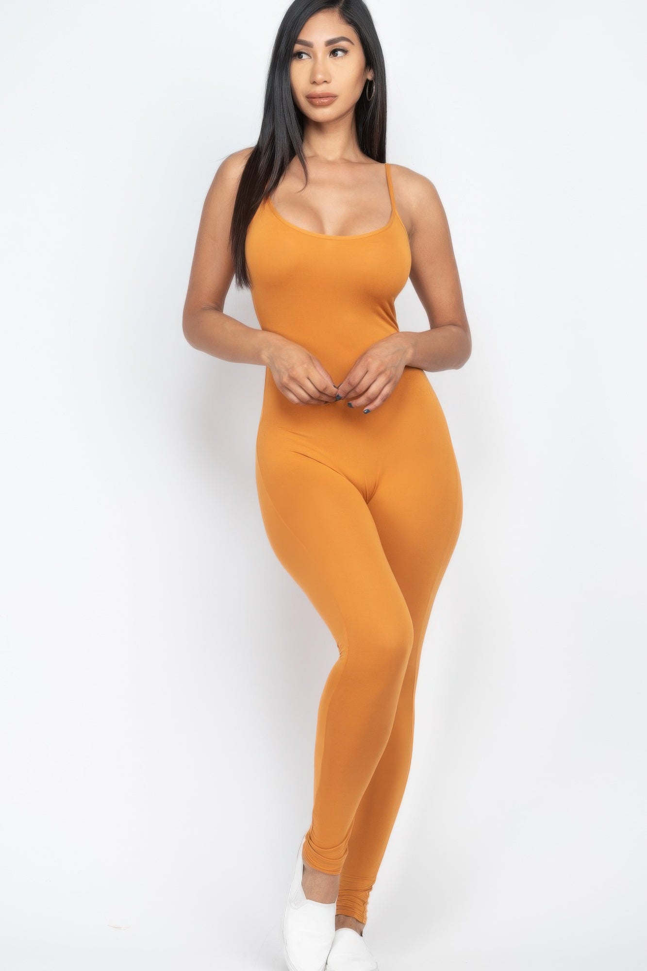 Black Golden Heir Sculpted Bodycon Cami Jumpsuit displayed on a mannequin, showcasing its fitted design and sleek style.