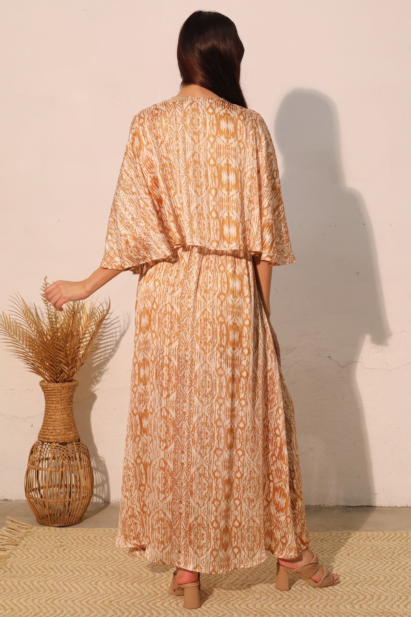 Golden Heir Bohemian Lurex Chiffon Cape Maxi Dress featuring flowing chiffon fabric and intricate gold accents.