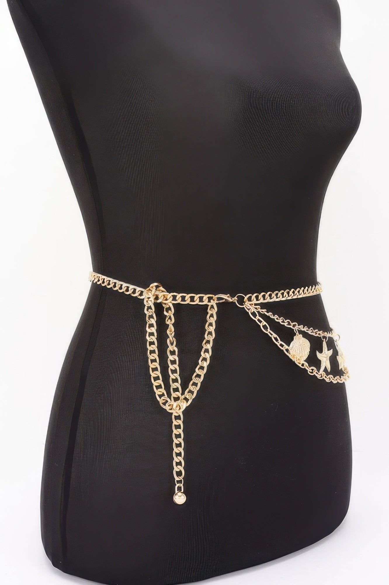 Golden Heir seashell starfish layered chain belt in gold, featuring intricate shell and starfish charms on a stylish chain belt.