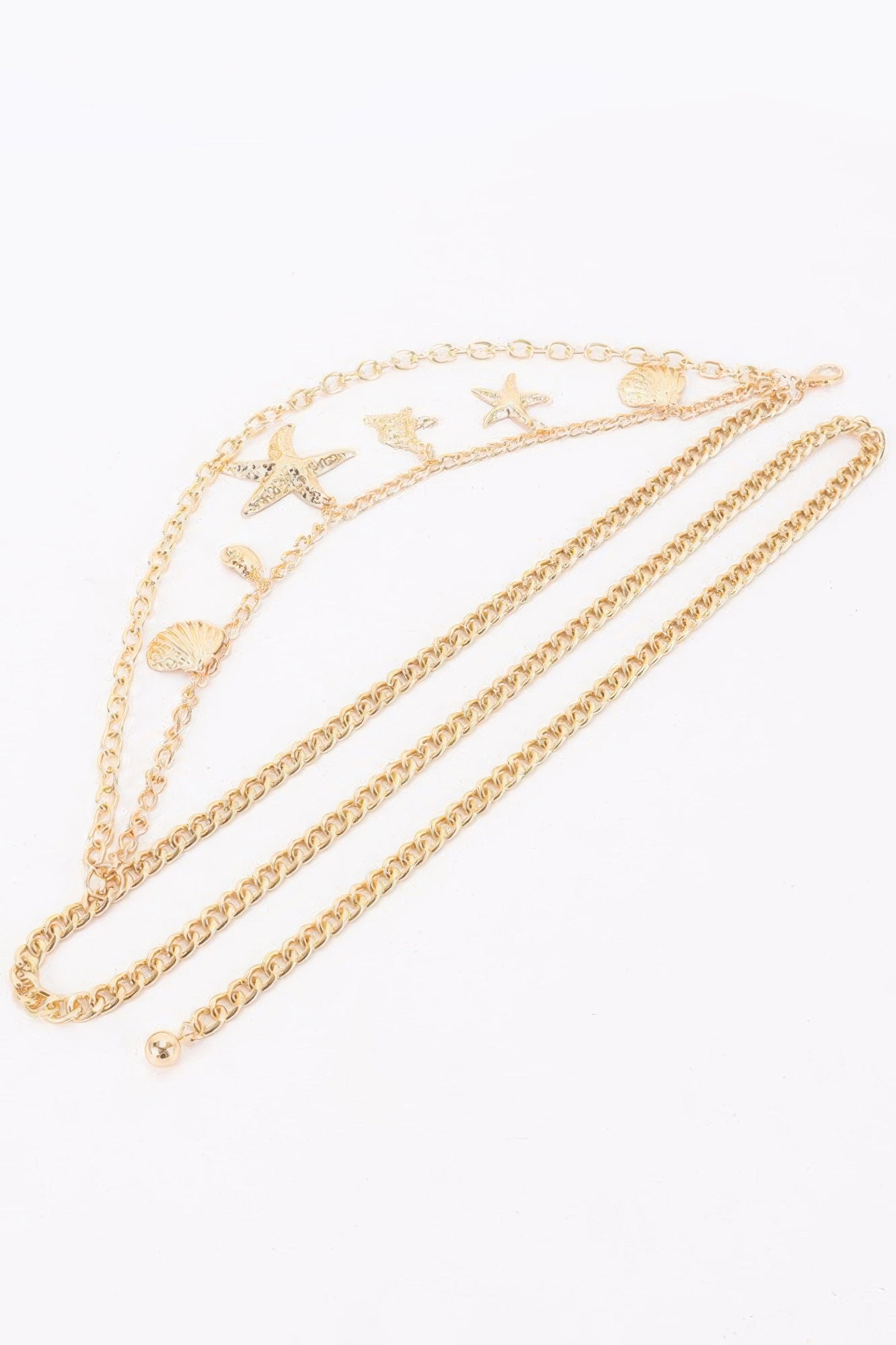 Golden Heir seashell starfish layered chain belt in gold with adjustable length, featuring shell and starfish charms.