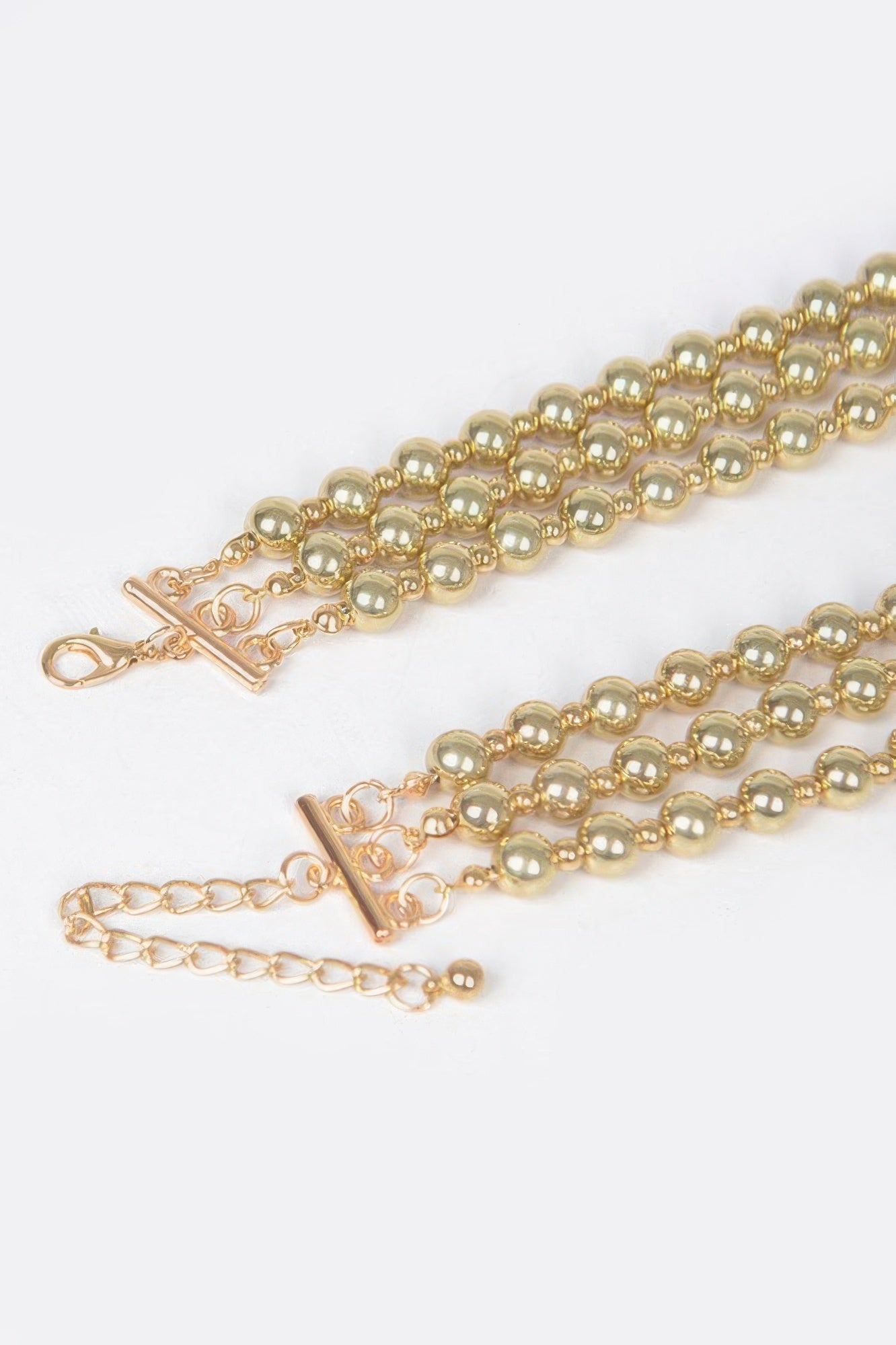 Golden Heir Orion Spherical Vanguard Set featuring two 17-inch architectural polished ball necklaces in a coordinated gold design.