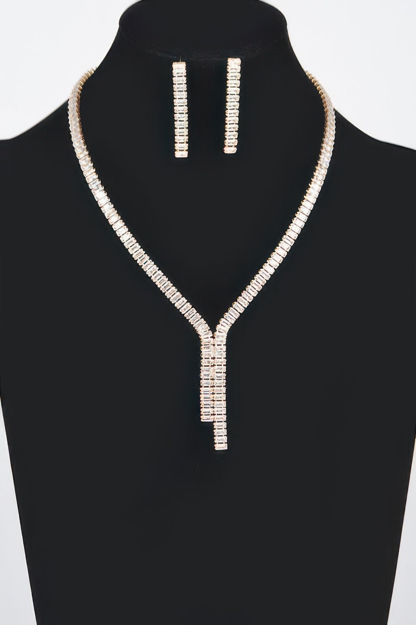 Golden Heir Lumière Duo rhinestone necklace and earrings set in imperial gold and clear stones, elegant coordinated jewelry.