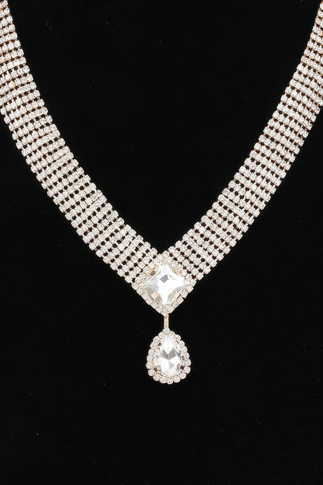 Golden Heir Aethelgard Gala Suite featuring a 17-inch rhinestone necklace and matching earrings in clear and golden tones.