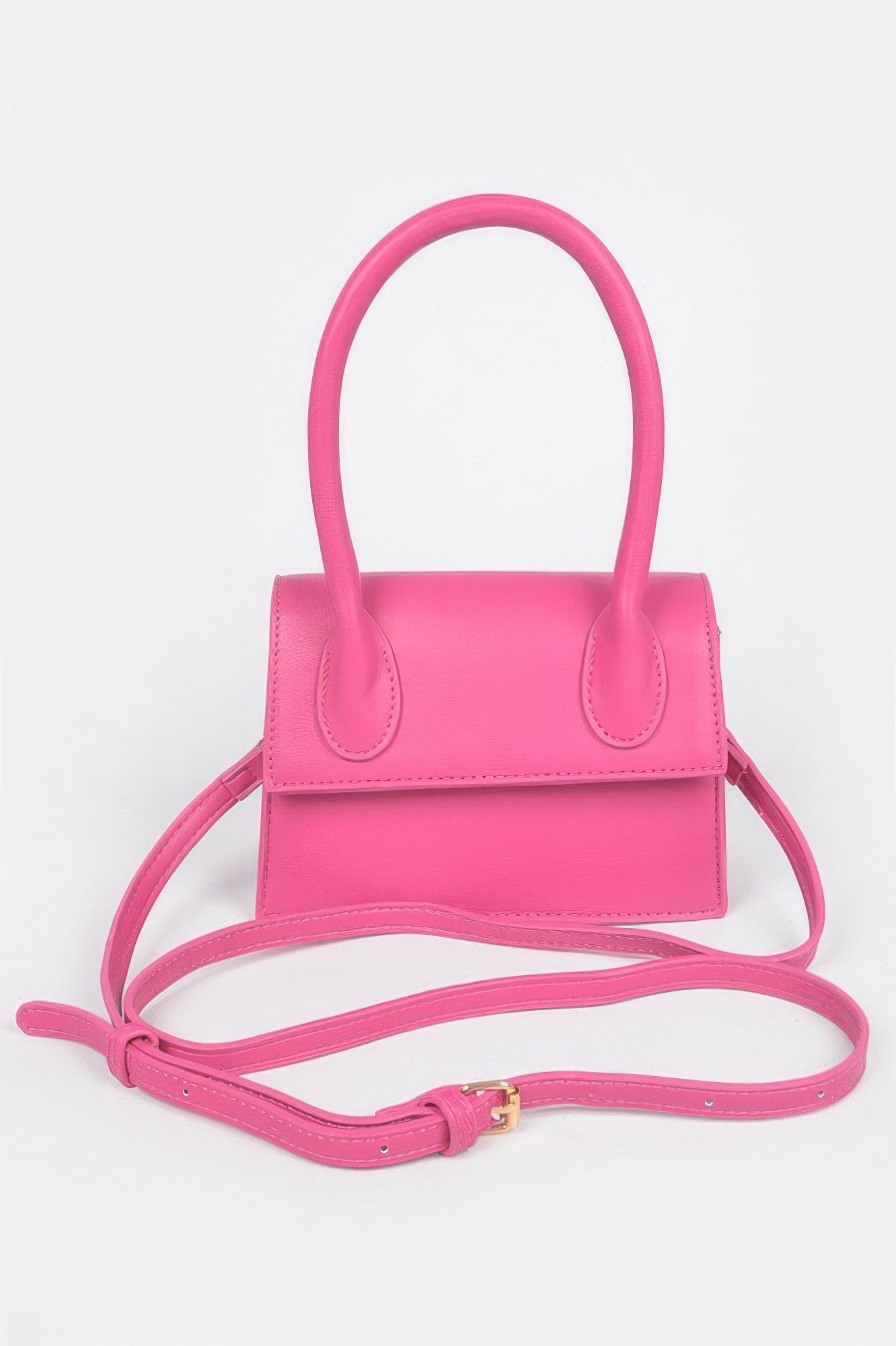Golden Heir faux leather crossbody bag with top handle and berry-colored accents, stylish and compact for everyday use.